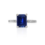 Anillo Oro Blanco Zafiro 3.00 ct y Diamante Lateral .12 ctw