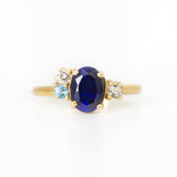 Anillo Oro Amarillo Zafiro 1.10 ct, Diamante, Topacio Azul y Aquamarina de .05 ct